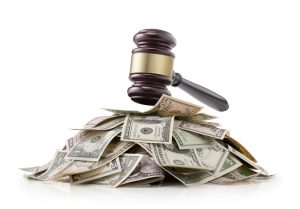 gavel on a pile of money-bankruptcy